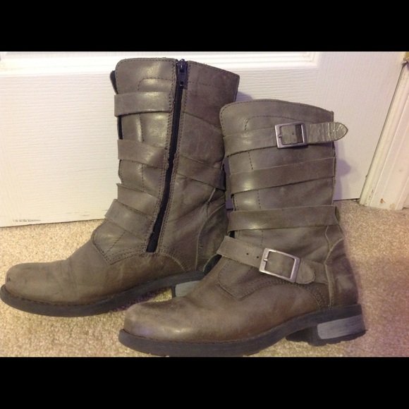 Grayish zip up boots with decorative buckle. S36