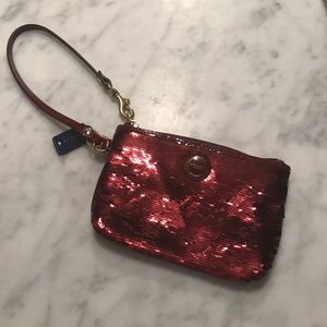 BNWOT Coach sequined wristlet, maroon, never used