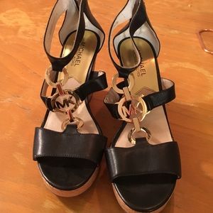 Michael Kors black monogrammed wedges