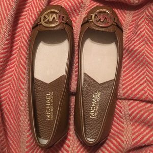 Size 5 never been work Michael Kors flats