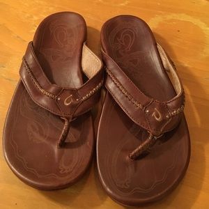Olukai brown leather flip flops