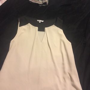 Loose creme and black top