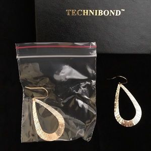 Technibond drop dangle earrings.