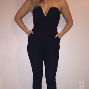 Adorable fitted black jumpsuit.