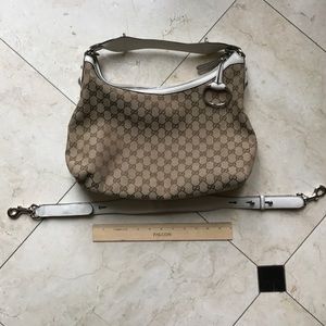 Gucci canvas tan and white shoulder bags.