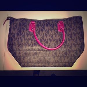 Authentic Michael Kors purse with pink accents