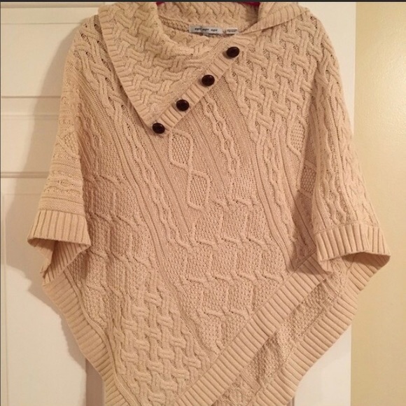 Beautiful sweater poncho with button detail.