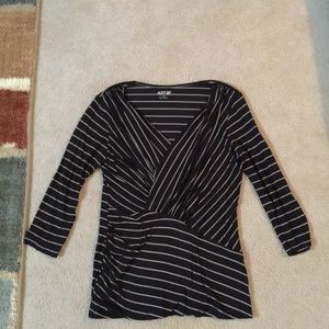 Dressy black 3/4 sleeve blouse with cream stripes.