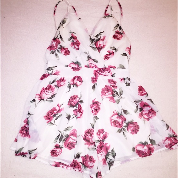 Urban Outfitters Dresses & Skirts - Akira Open Back Floral Flowy Surplice Wrap Romper