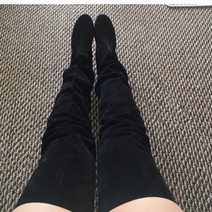 Thigh-high flat boots