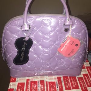 Lavender hello kitty embossed handbag