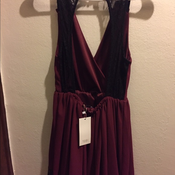 Maroon dress with black lace back and hemline. - Picture 4 of 4