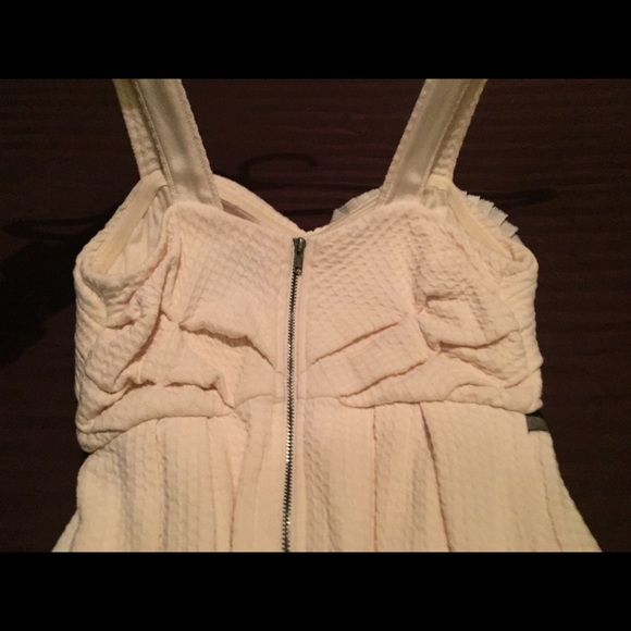 Cream dress from Anthroplogie with flower detail. - Picture 3 of 4