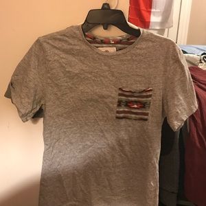 Short sleeve tribal pocket