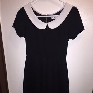 Black dress with white collar