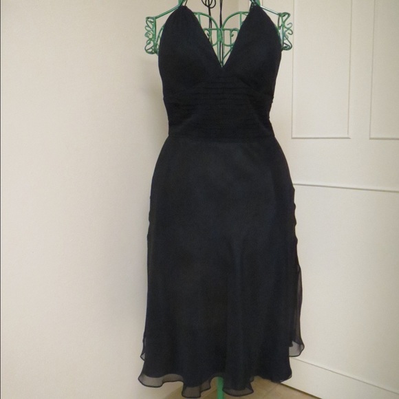 Black silk mid length dress. New with tags