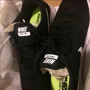 Black Nike Free runs size 10.5