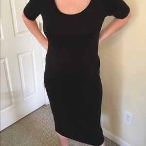 Black dress worn as maternity