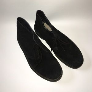 Clack's black boot
