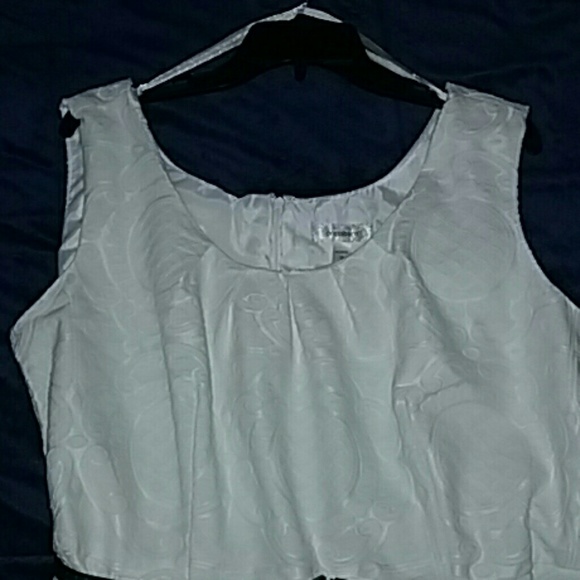 White summer dress. Hard to see in a photo.