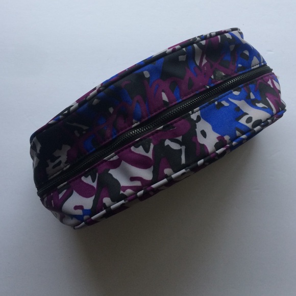 Fabletics cosmetics case with detachable pouch.