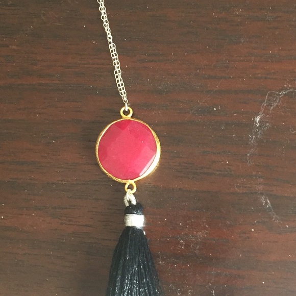 Sterling silver red stone tassel necklace.