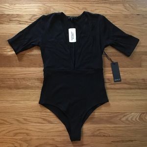 Black Forever 21 knit bodysuit.
