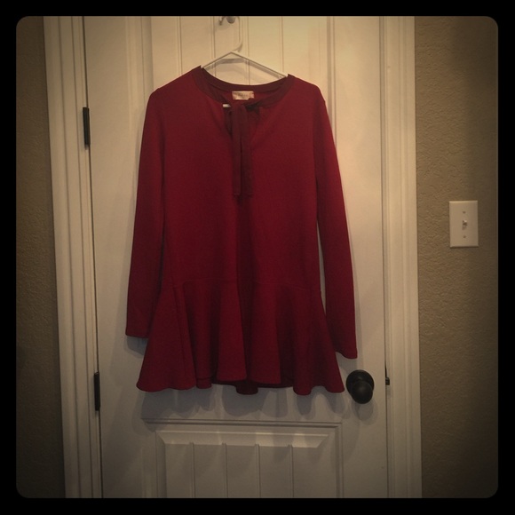 Long sleeve maroon peplum style shirt