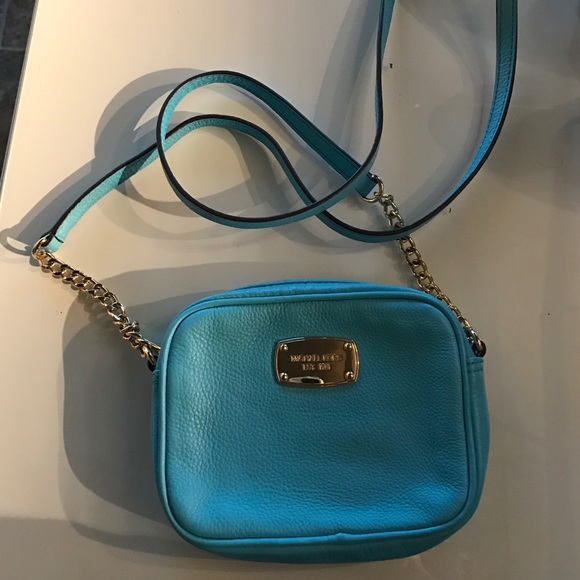Micheal Kors turquoise cross body!
