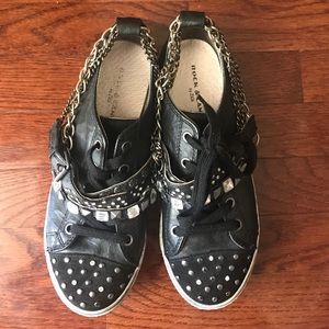 Distressed punk sneakers