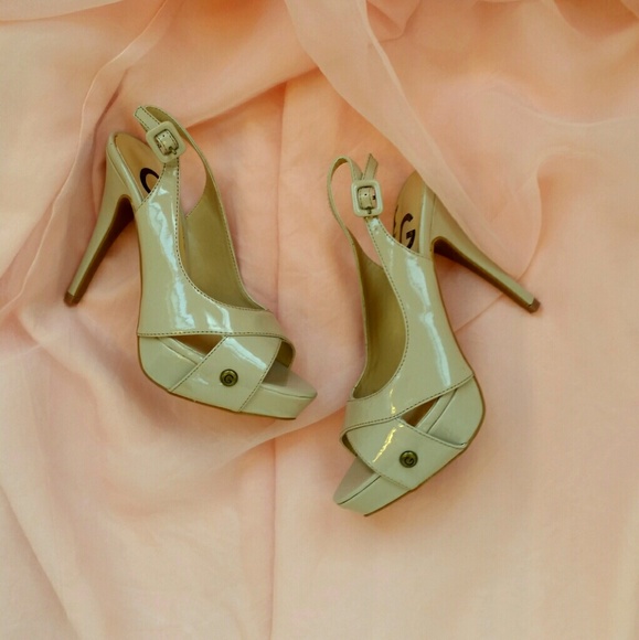 Tan platform peep toe heels g by Guess 6m