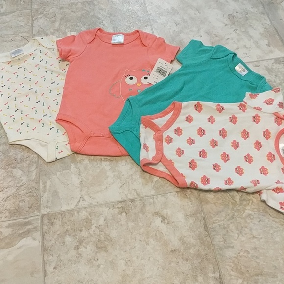 NWT 4 piece baby gear bodysuits