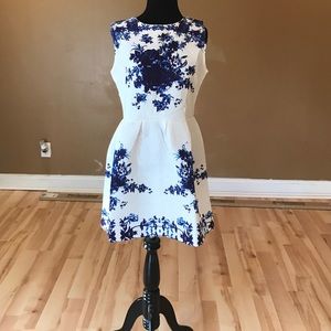 White skater dress with blue flowers