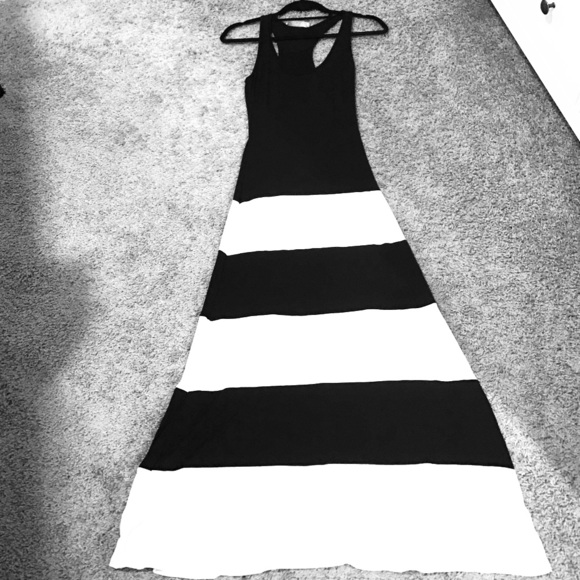 Black and white sleeveless maxi dress.
