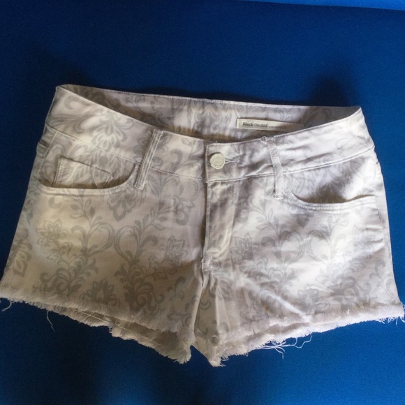 White patterned jean shorts