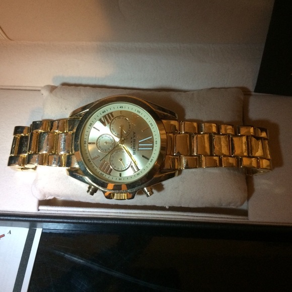 Gold Akribos watch