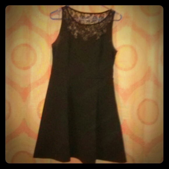 Black mini dress. W/ lace.