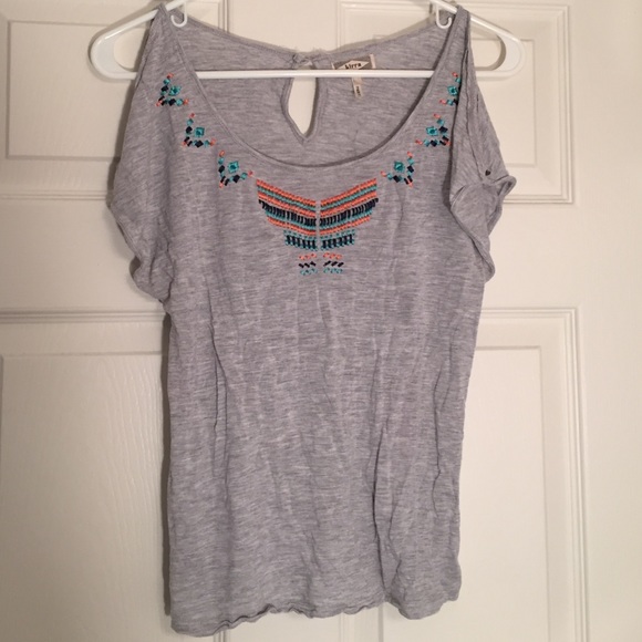 Grey cut open sleeved shirt from PAC sun