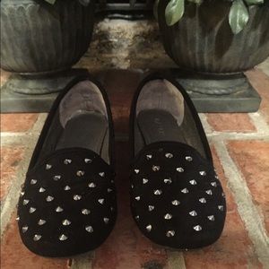 Studded black suede flats