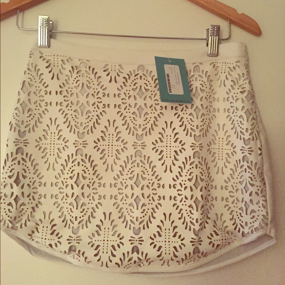 Vegan leather laser cut white mini skirt NWT!