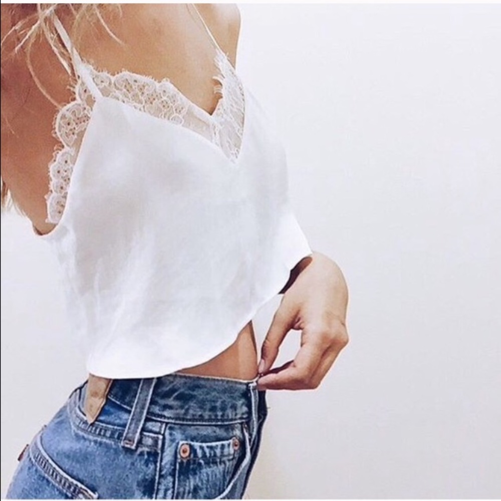 Brandy Melville blush top with button back.
