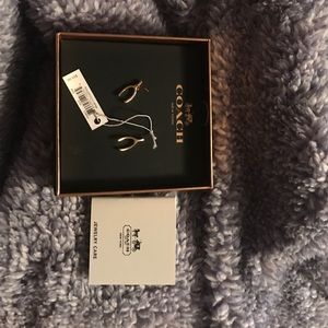 Gold Wishbone Coach Earrings