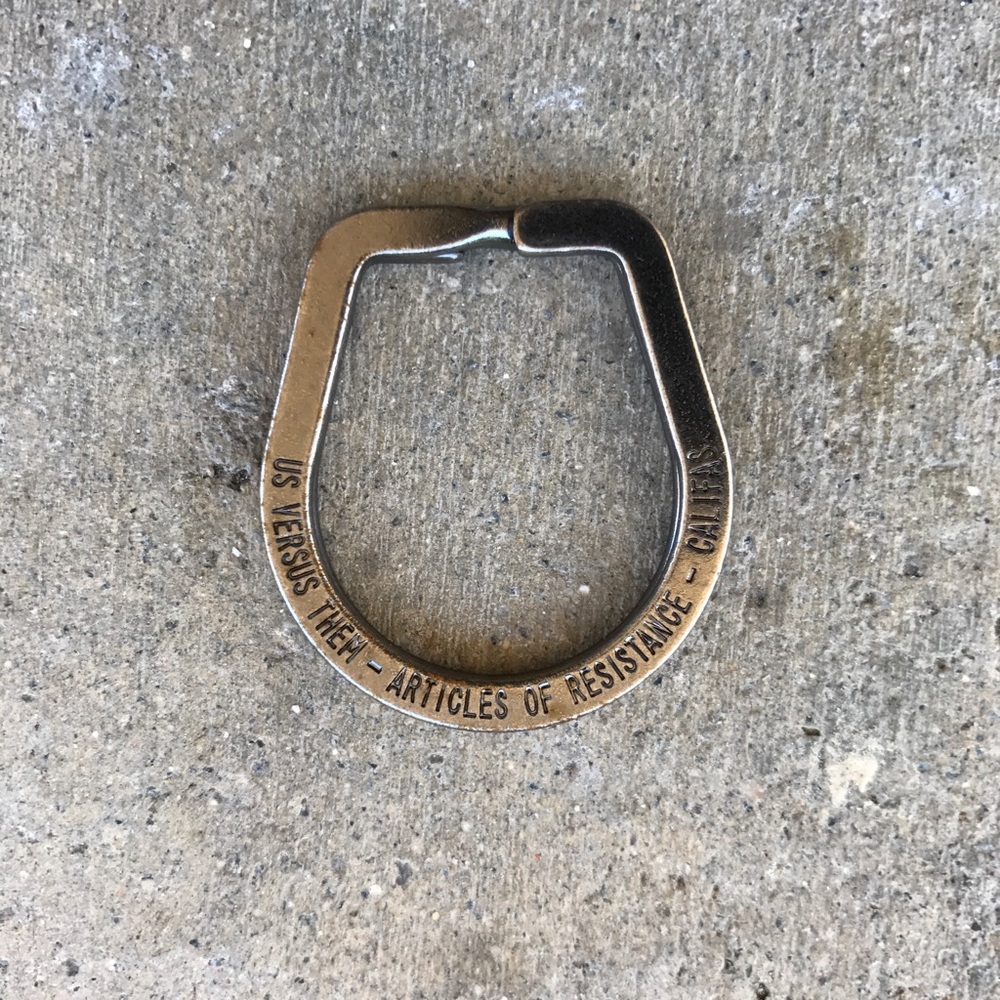 Us Versus Them Key Ring