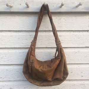 Brown slouchy hobo bag by Hobo.