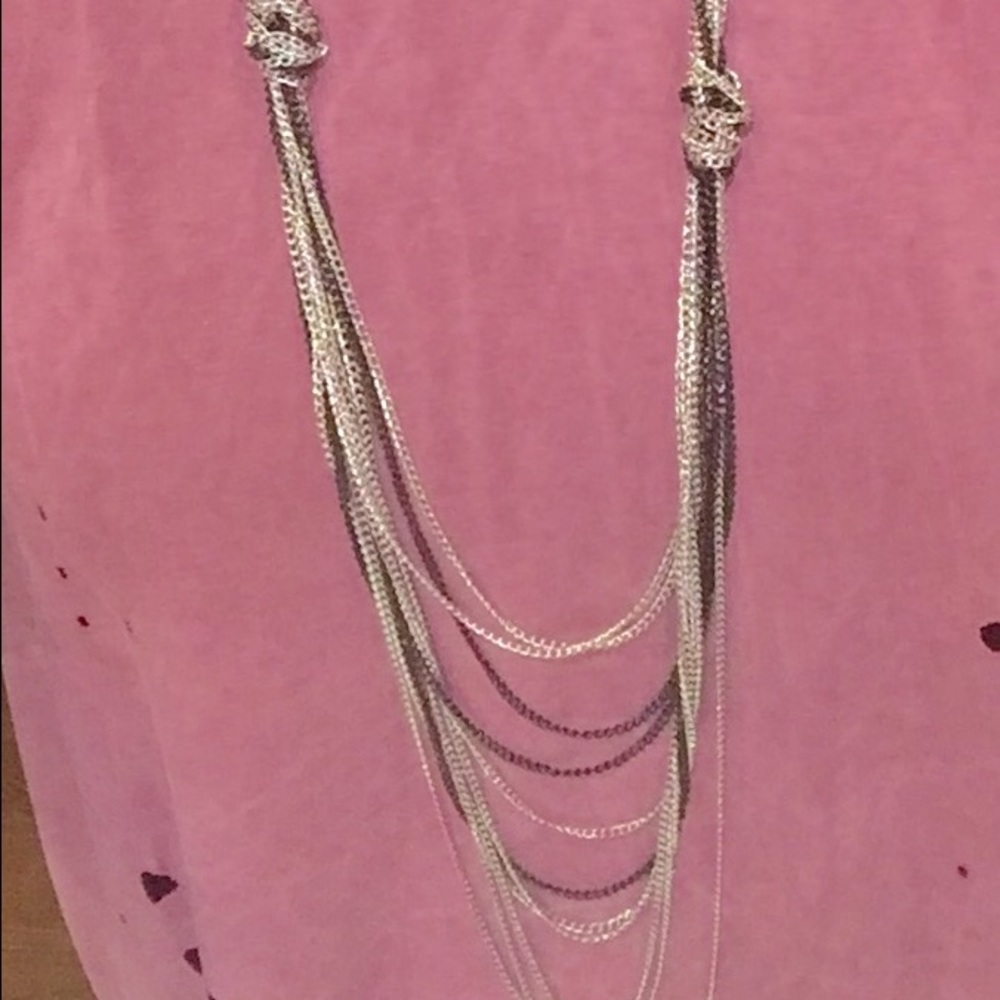 Silver and black multi-strand long necklace.