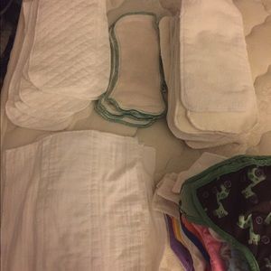 Pocket cloth diapers and inserts