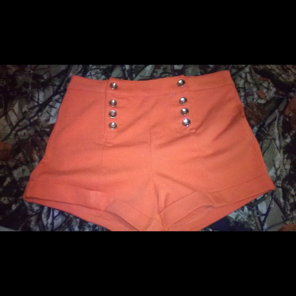 Orange high waisted shorts