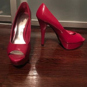 Pink patent leather pumps