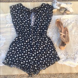 Vintage navy romper: pockets ruffle trim front bow