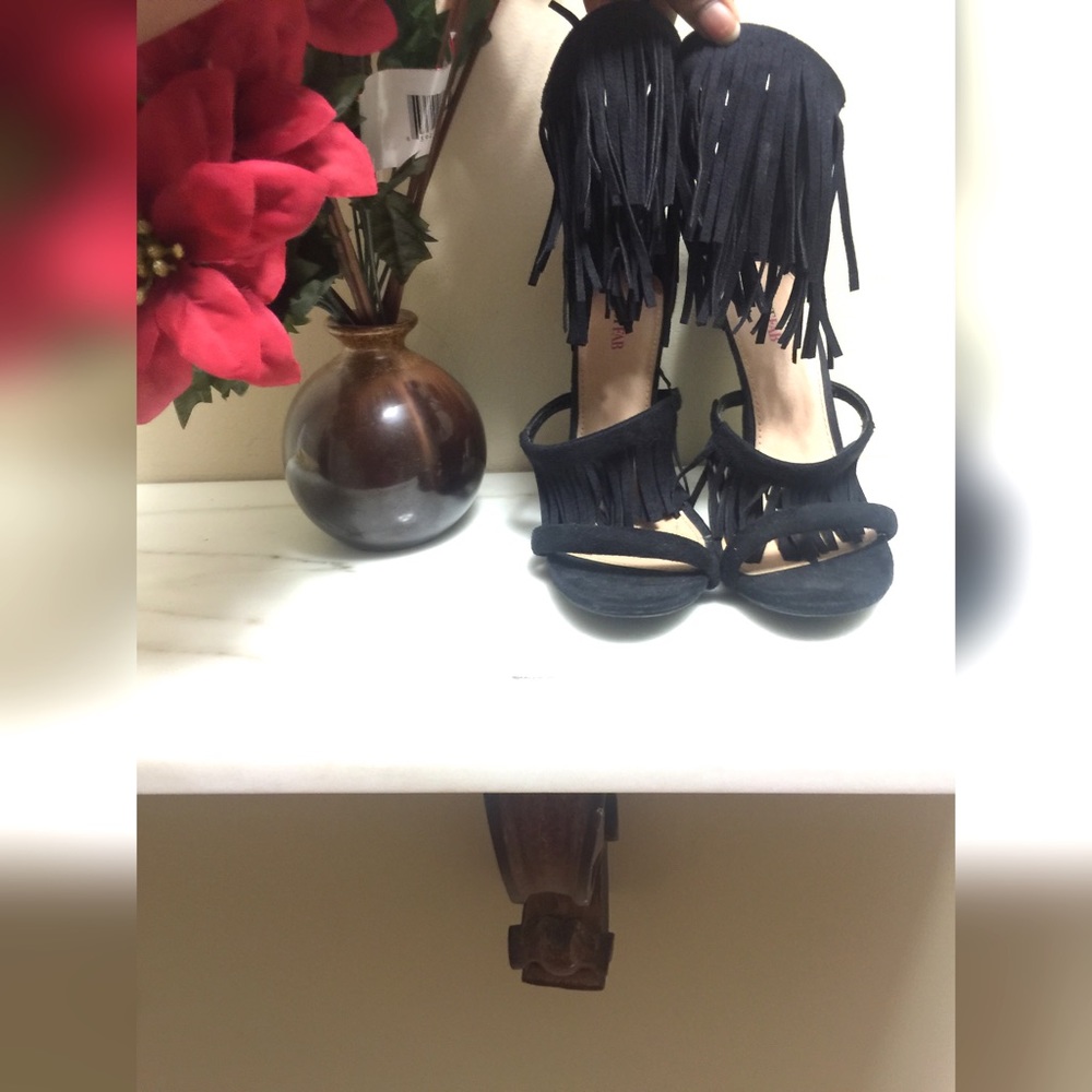Black fringe heels